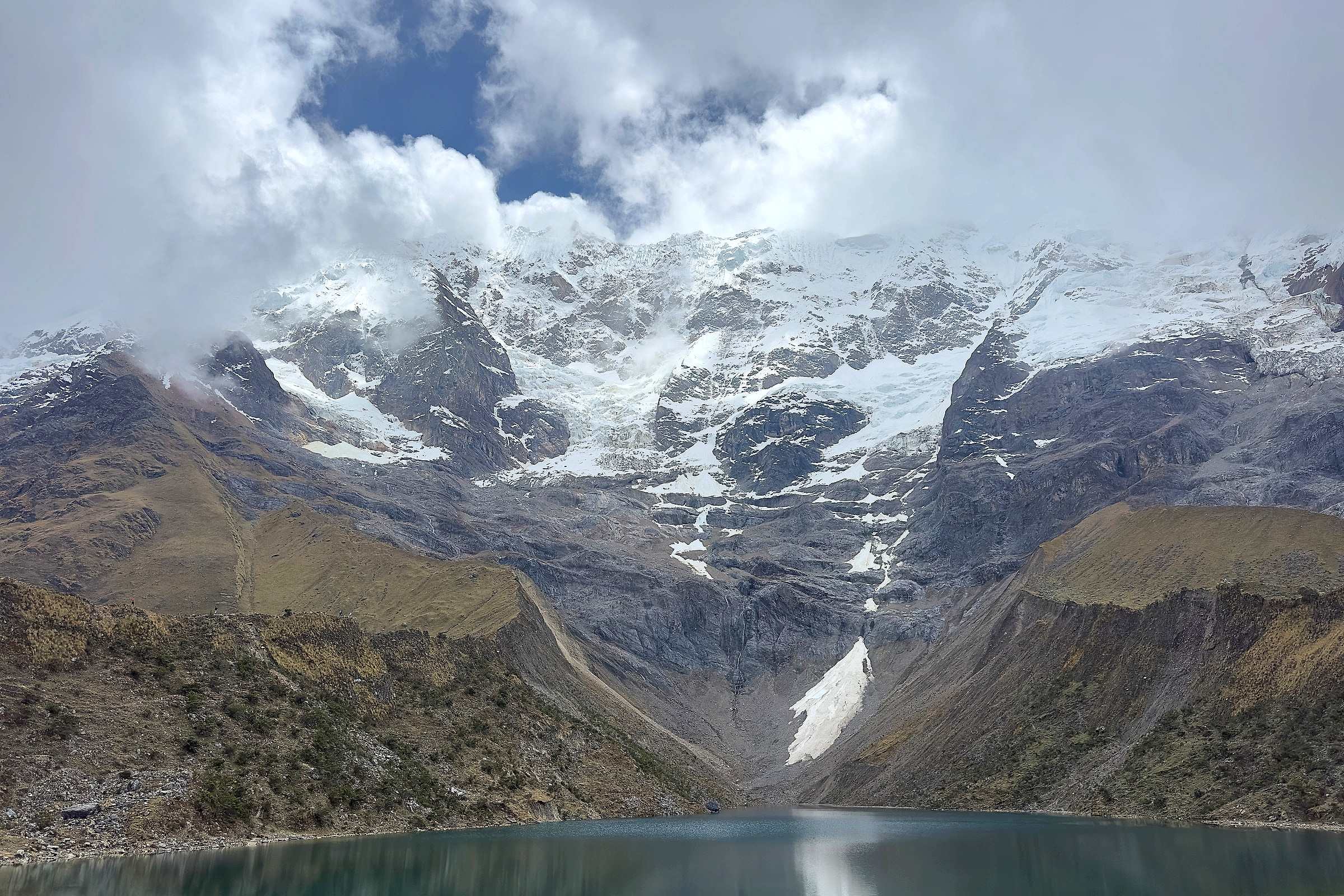 Humantay Lake below the snow and glacier of Humantay mountain, near Cusco in Peru